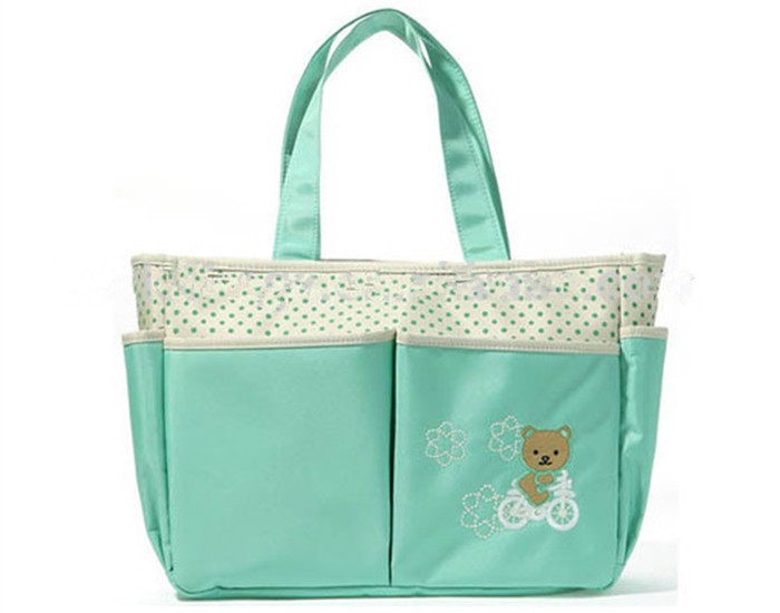 Luz - logotipo em mudança do bordado dos sacos do bebê à moda bonito verde da tela na parte dianteira